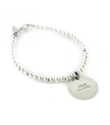 Pulsera personalizada de plata con medalla y nombre grabado